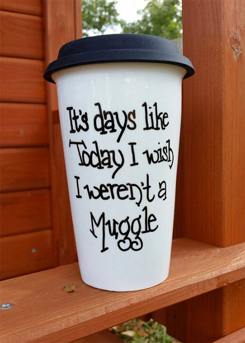Coffee mug with words written " It's days like today I wish I weren't a Muggle."